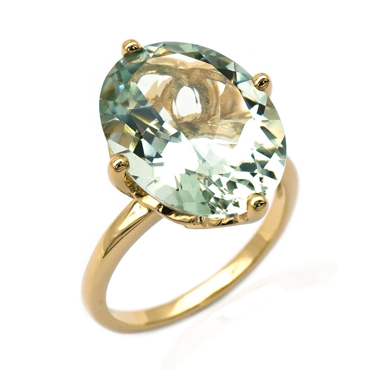 Oval cut gemstone ring with prasiolite, green amethyst.
