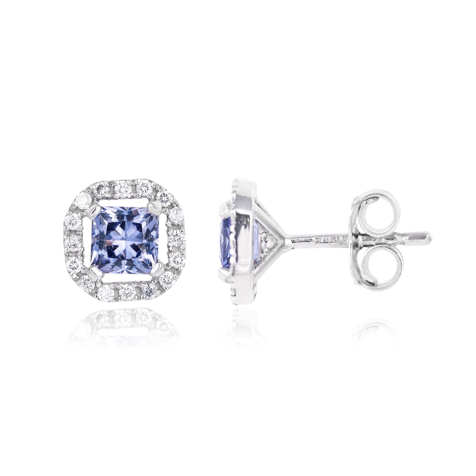 Unique, one of kind, lavender spinels from Madagascar with diamond stud earrings.