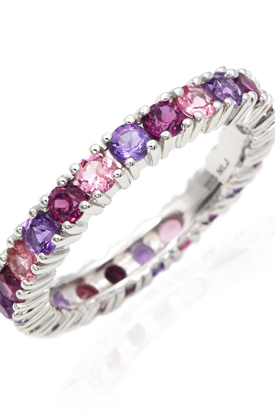 Purple amethyst, pink tourmaline and rhodolite multi-gemstone eternity ring in rhodium plated 925 sterling silver. The classic eternity ring with a colourful purple and pink twist! Natalina Jewellery - fun and feminine gemstone jewellery. International shipping available.