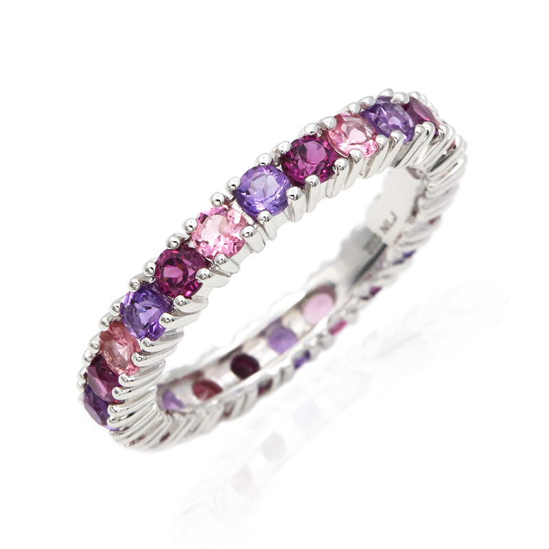 Purple amethyst, pink tourmaline and rhodolite multi-gemstone eternity ring in rhodium plated 925 sterling silver. The classic eternity ring with a colourful purple and pink twist! Natalina Jewellery - fun and feminine gemstone jewellery. International shipping available.