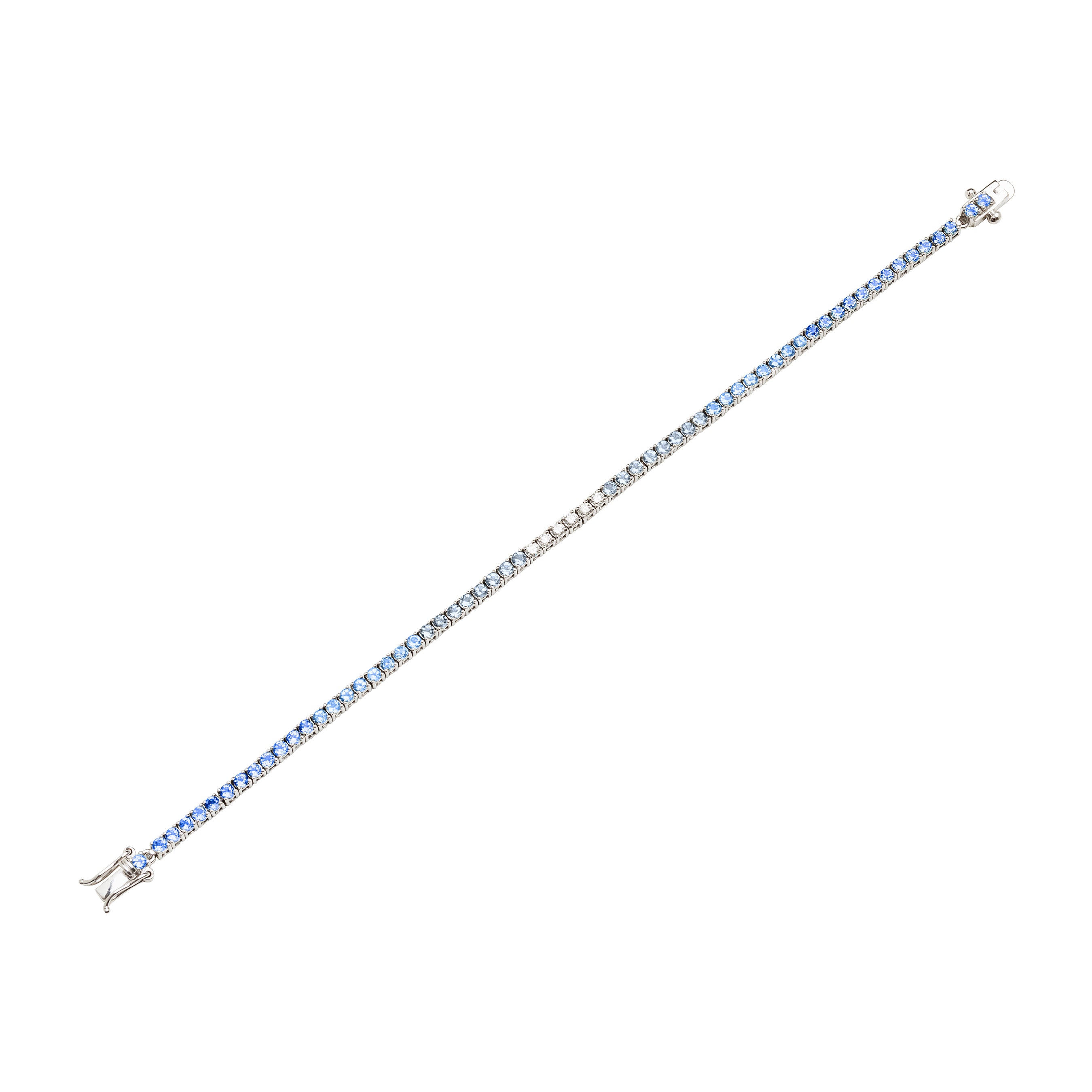 Pop aquamarine and diamond tennis bracelet, 10K solid rhodium plated white gold. This iconic tennis bracelet has a subtle blue twist! International shipping available.