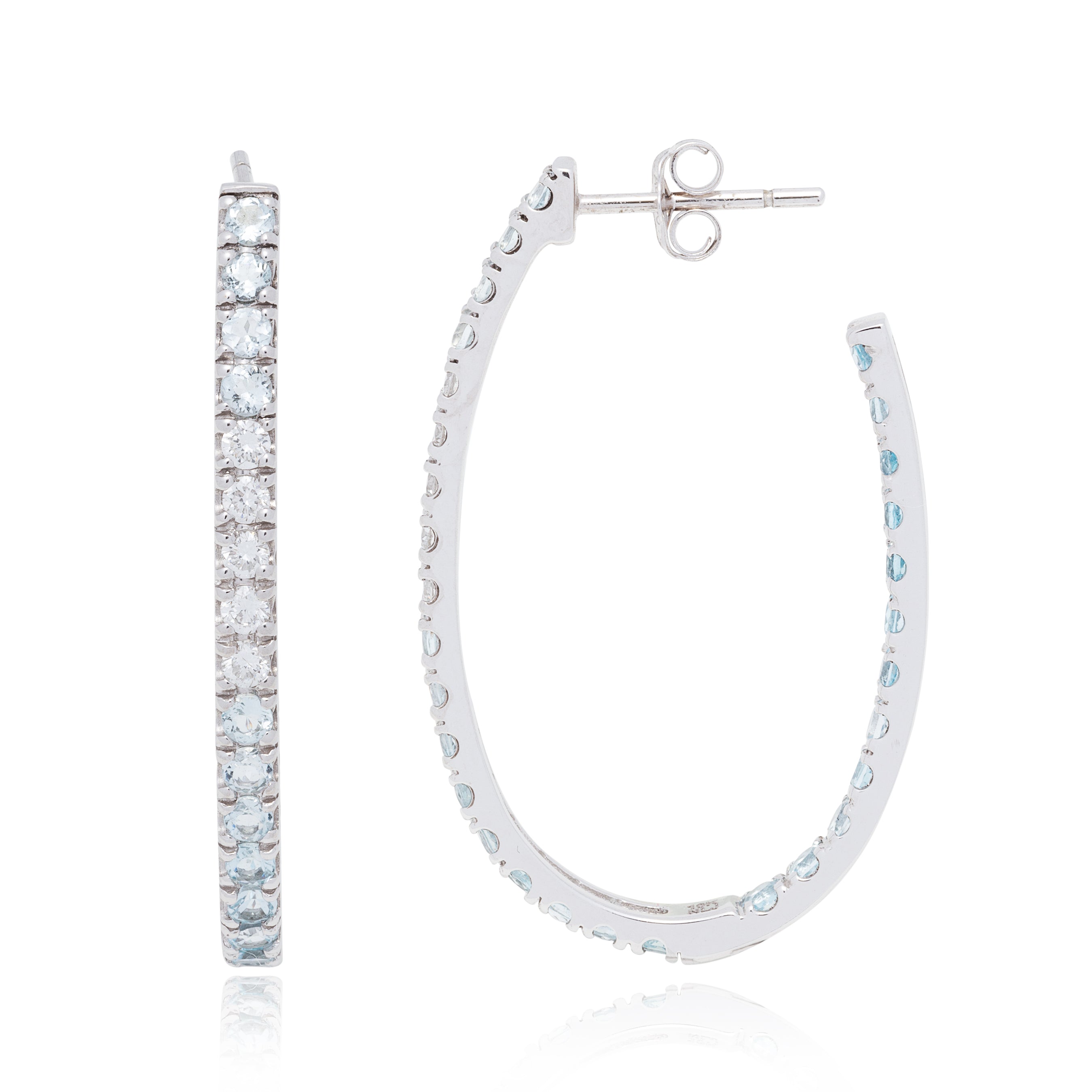 Pop aquamarine and diamond hoop earrings, 10K rhodium plated solid white gold. Our quintessential diamond hoops with a fabulous twist! International shipping available.