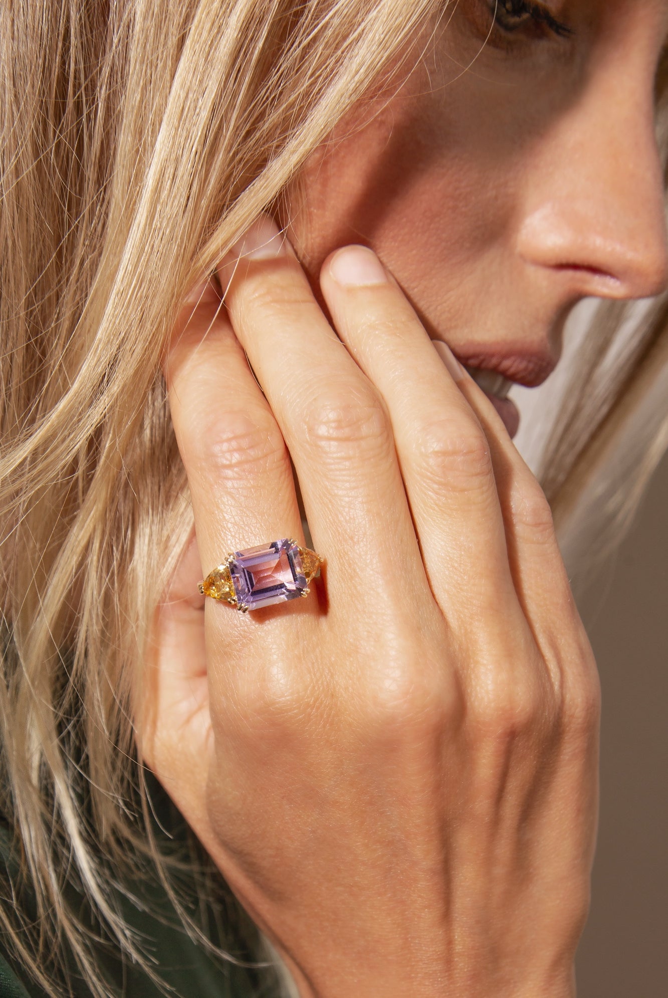 Modern gemstone jewelry. Amethyst and citrine cocktail ring.