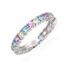 Swiss blue topaz, pink sapphire and lemon quartz eternity ring, rhodium plated 925 silver The most gorgeous, flirty and girly twist to the ever classic eternity ring! International shipping available.